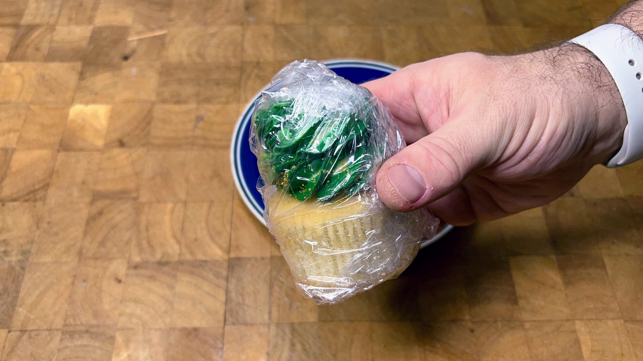 cupcake wrapped in plastic wrap.