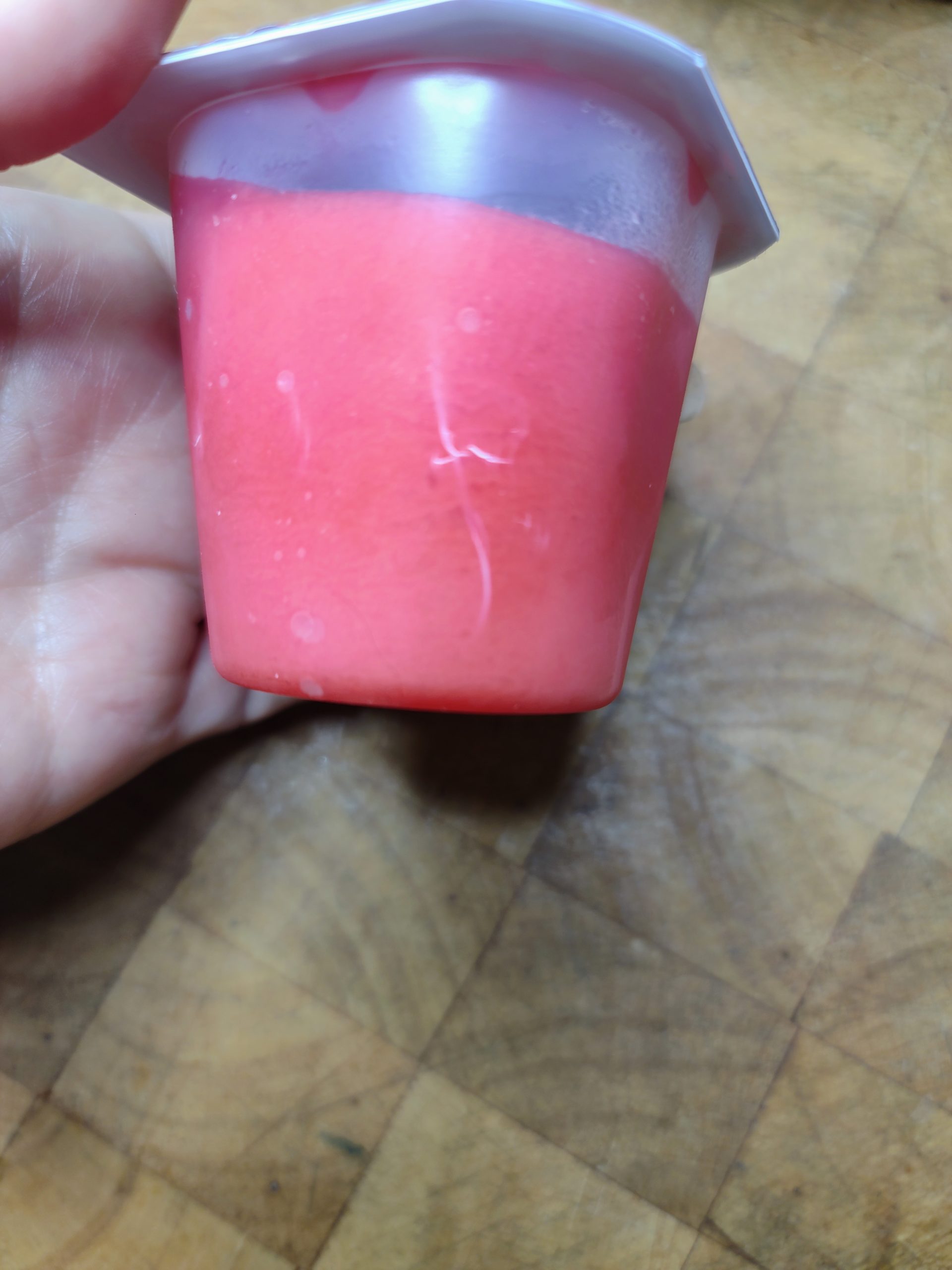jello frozen in store container that has crack in the container