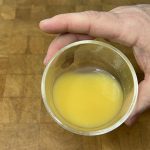 small bowl of defrosted orange juice