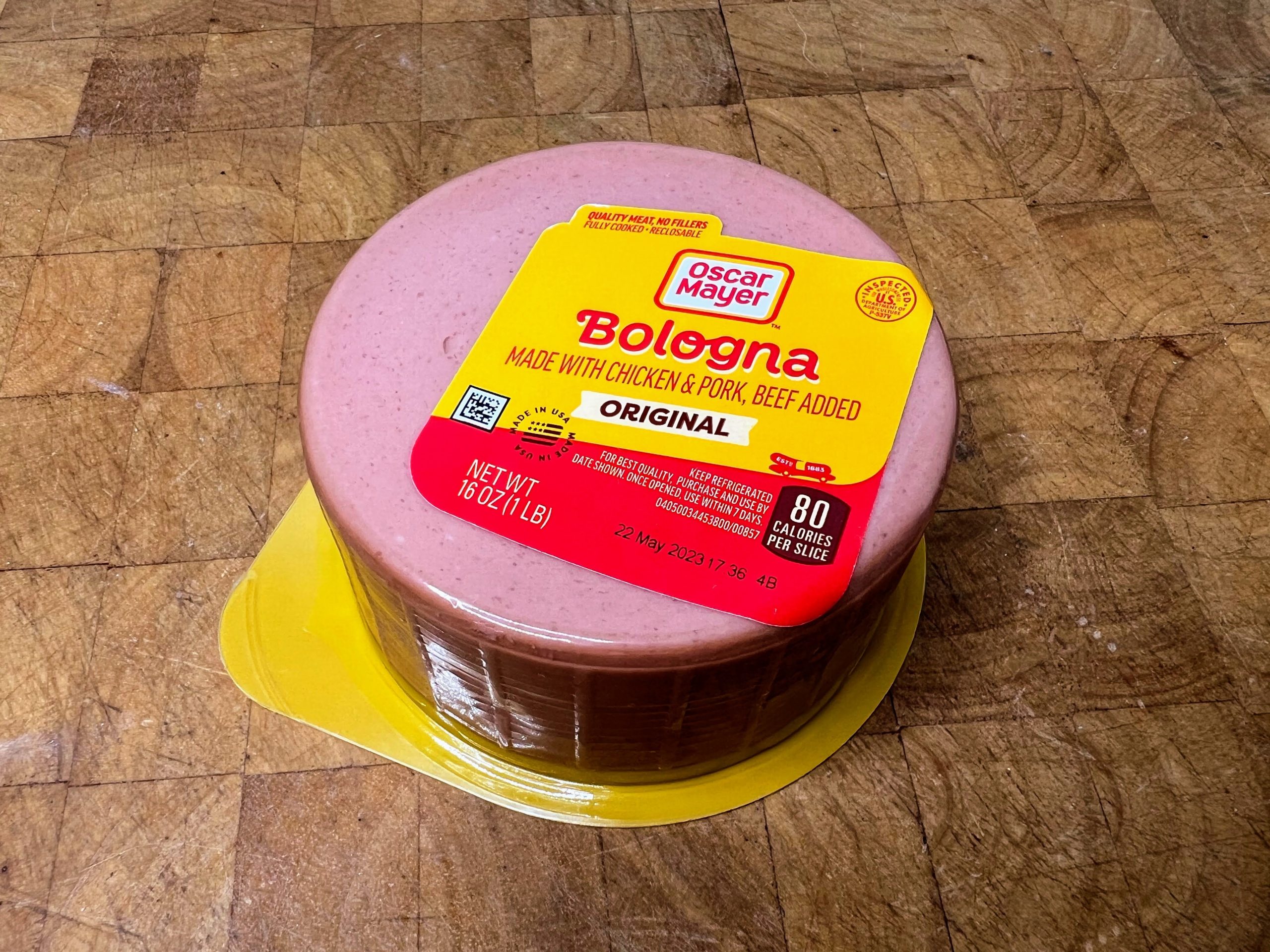 package of bologna on a wooden table