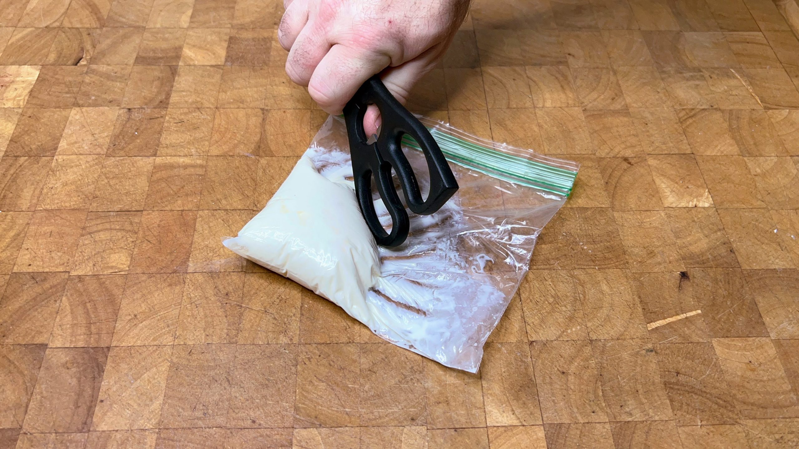 pressing mascarpone cheese town in the freezer bag