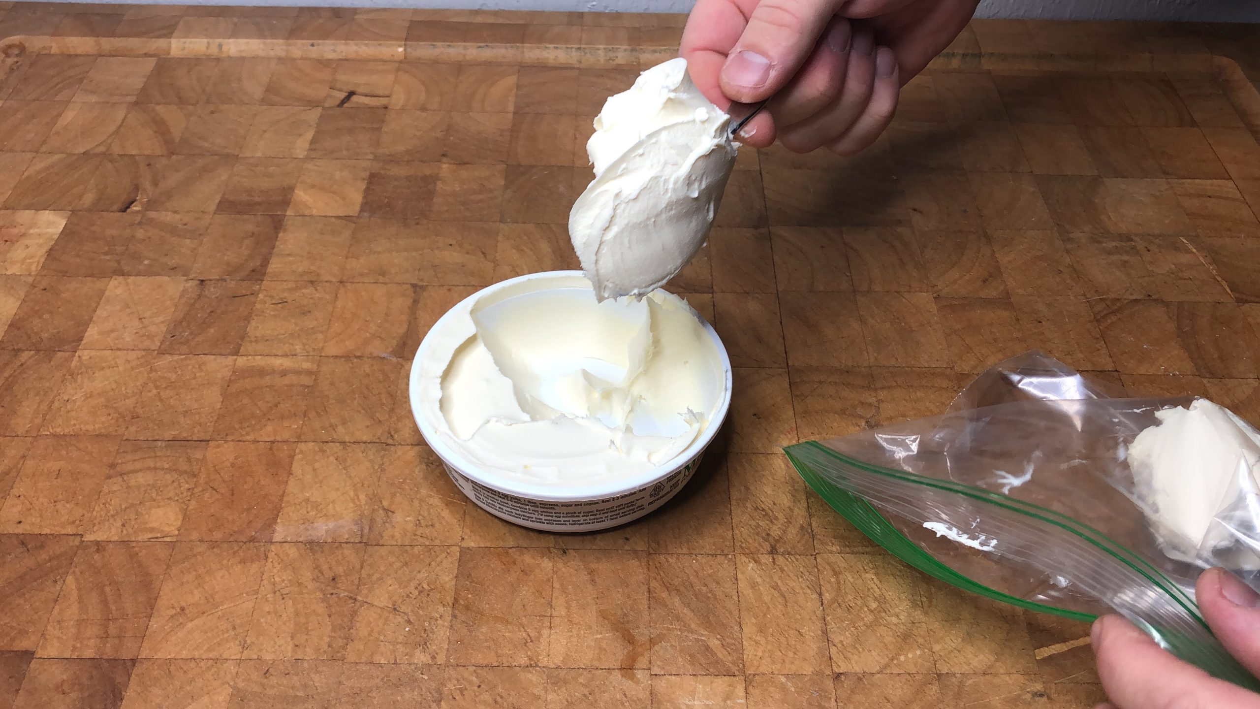 putting mascarpone cheese into a freezer bag