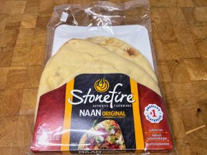 package of naan bread on a wooden table