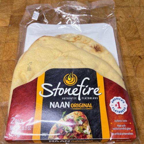 package of naan bread on a wooden table