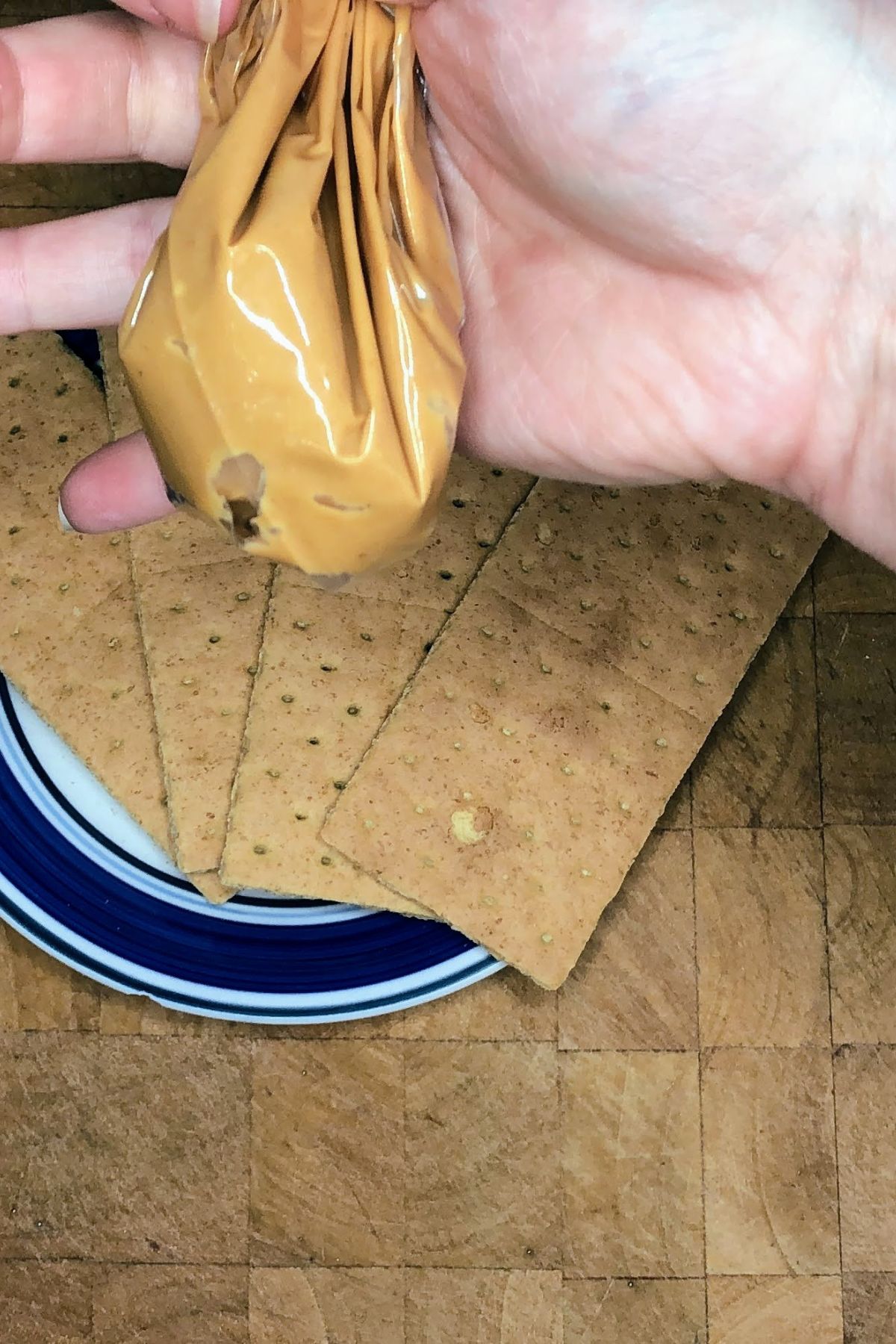 Peanut butter squeezed into the corner of a ziplock bag.