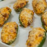 Air fryer jalapeno poppers on a plate.