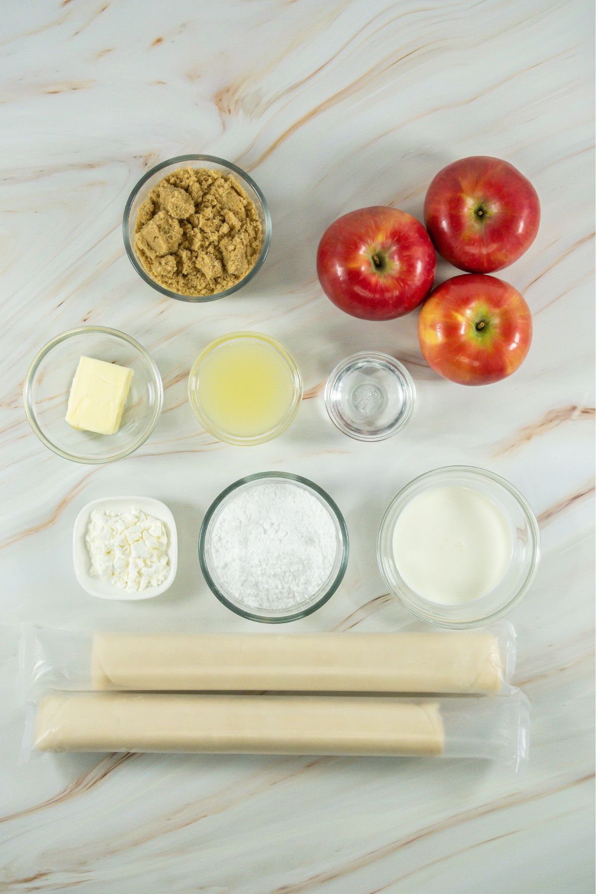 Apple pie cookie ingredients on a counter.