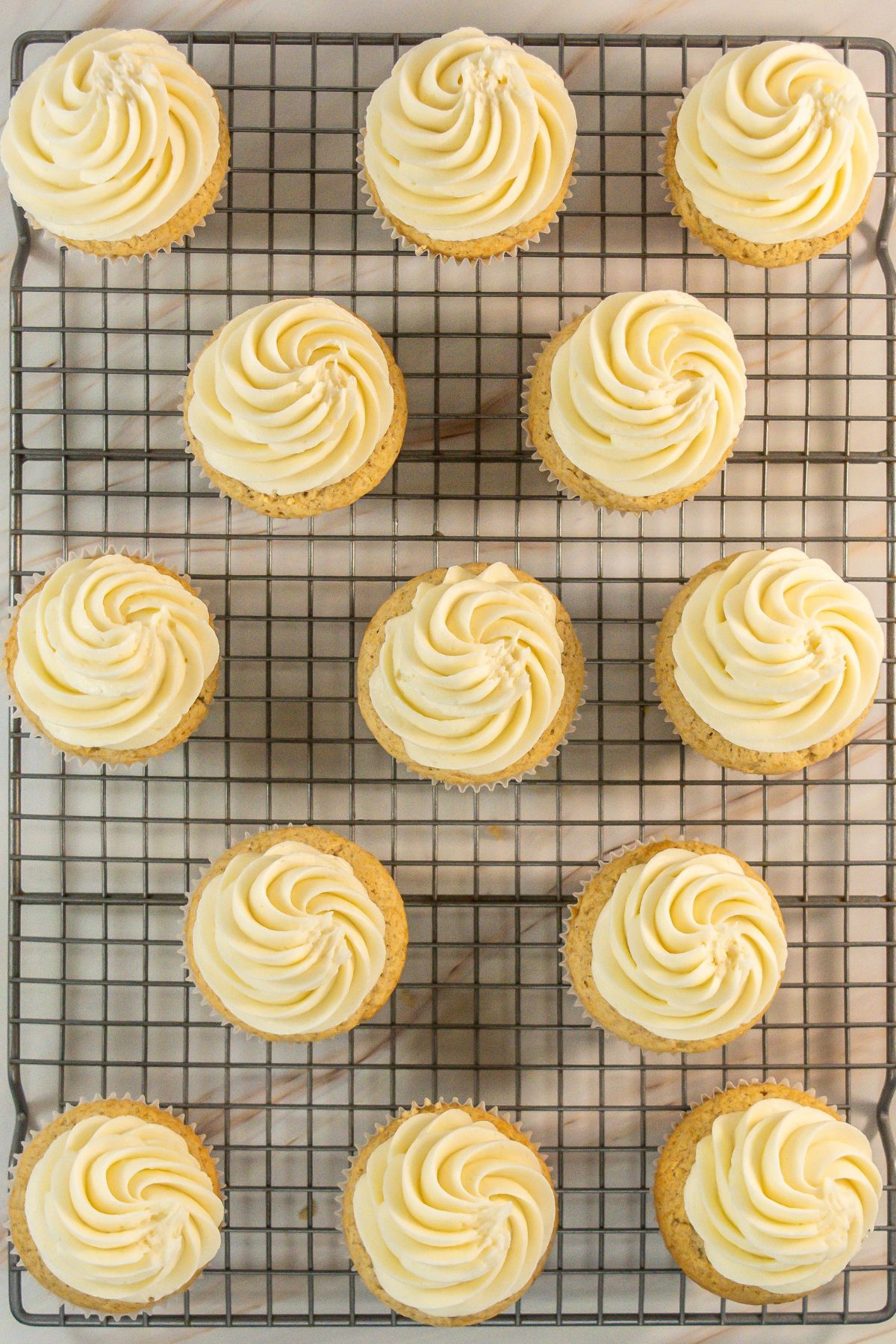 Cupcakes topped with frosting.