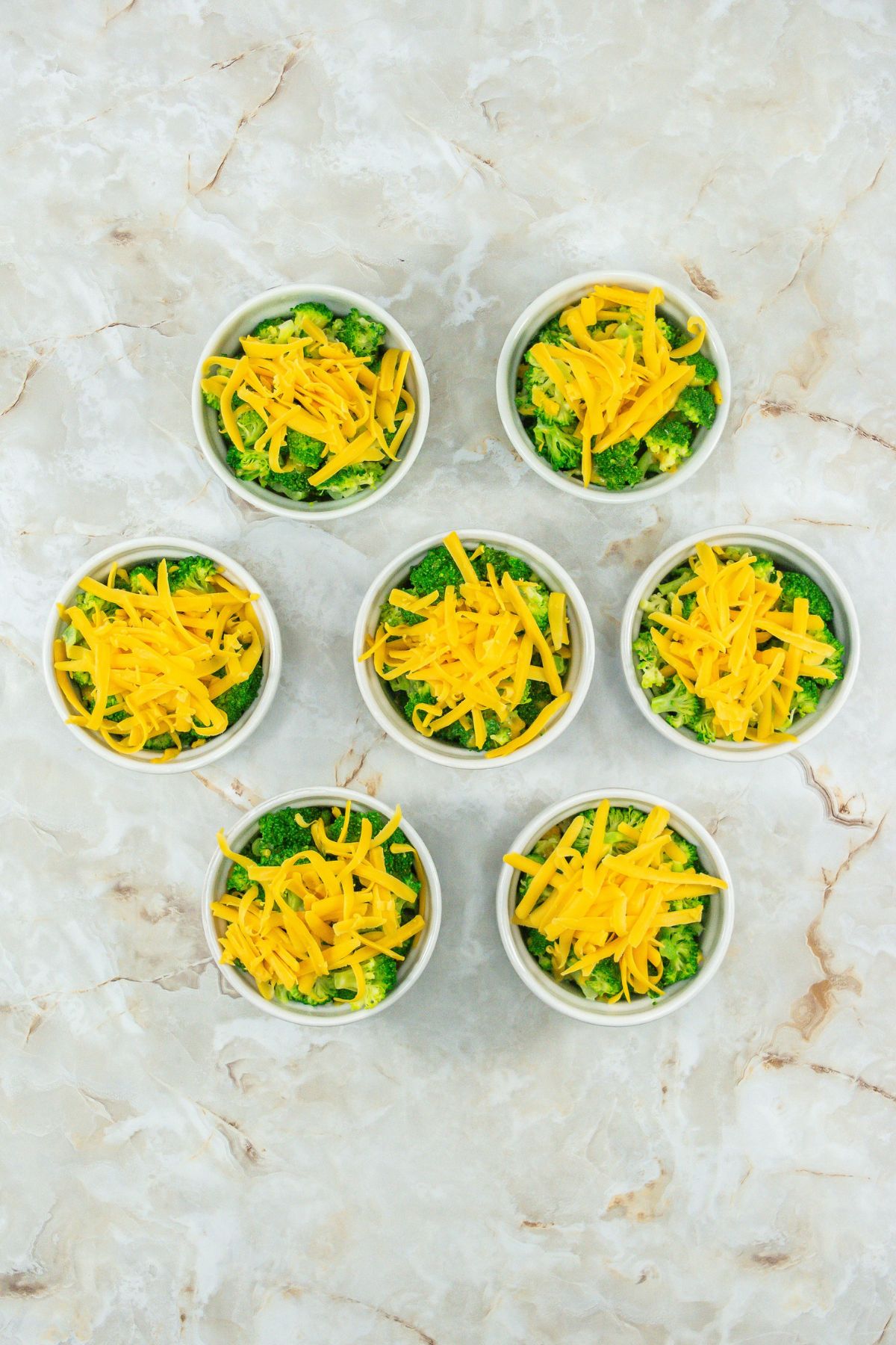 Cheese on top of broccoli.