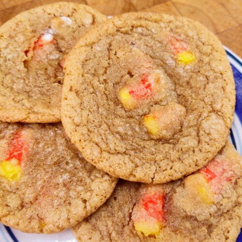 Candy corn cookies on a plate.