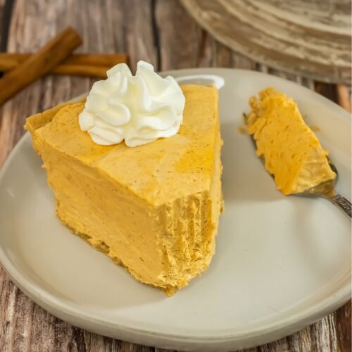 Slice of no bake pumpkin pie on a plate.