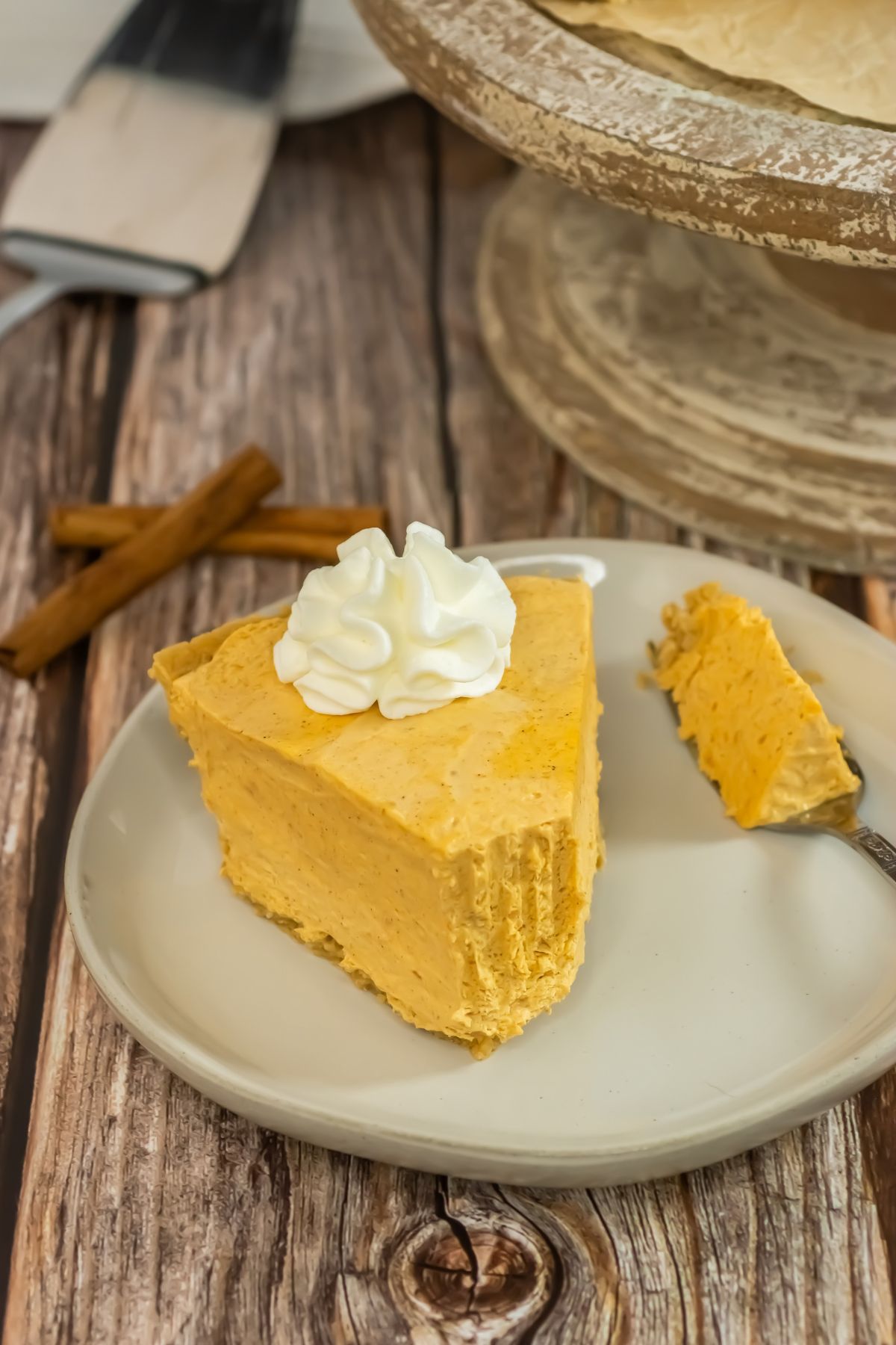 Slice of no bake pumpkin pie on a plate.