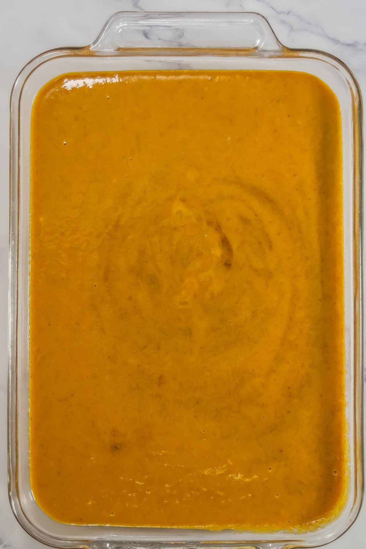 Pumpkin mix in baking dish.